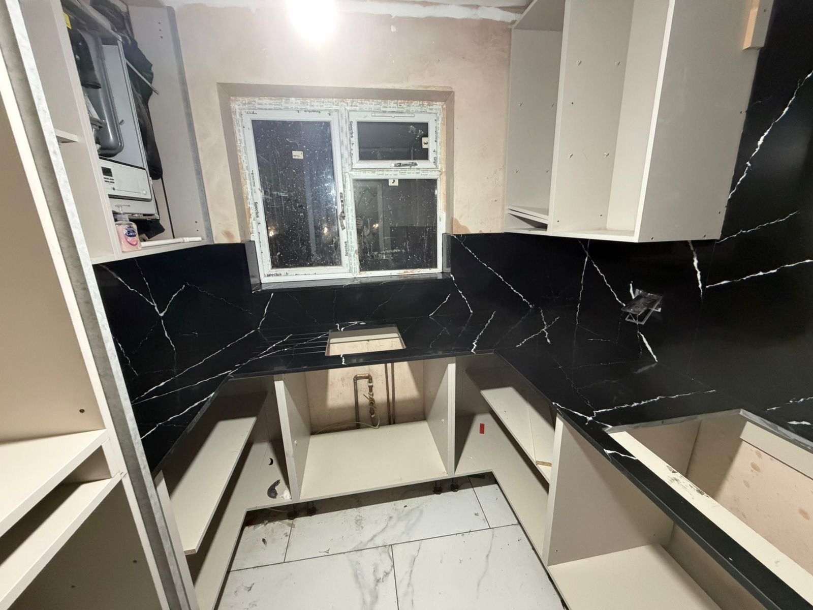 Black Marquina Utility Room