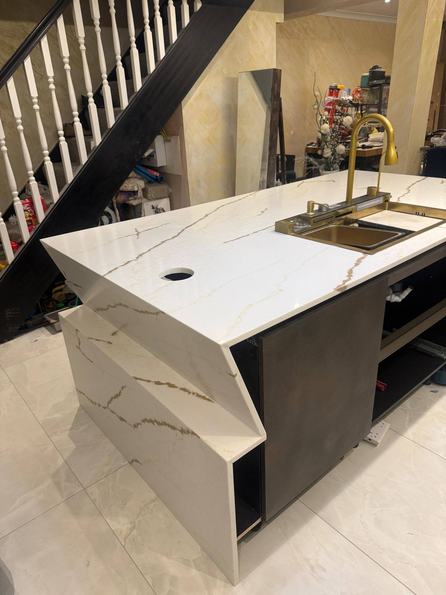 Calacatta gold quartz kitchen island with waterfall edge